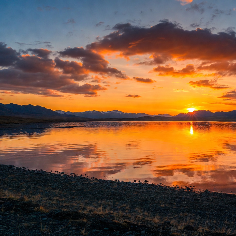 Sunset over mountain lake Sunset over mountain lake