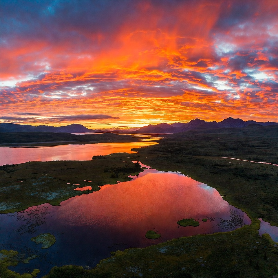 Vibrant Sunset Over Mountains and Lake Vibrant Sunset Over Mountains and Lake