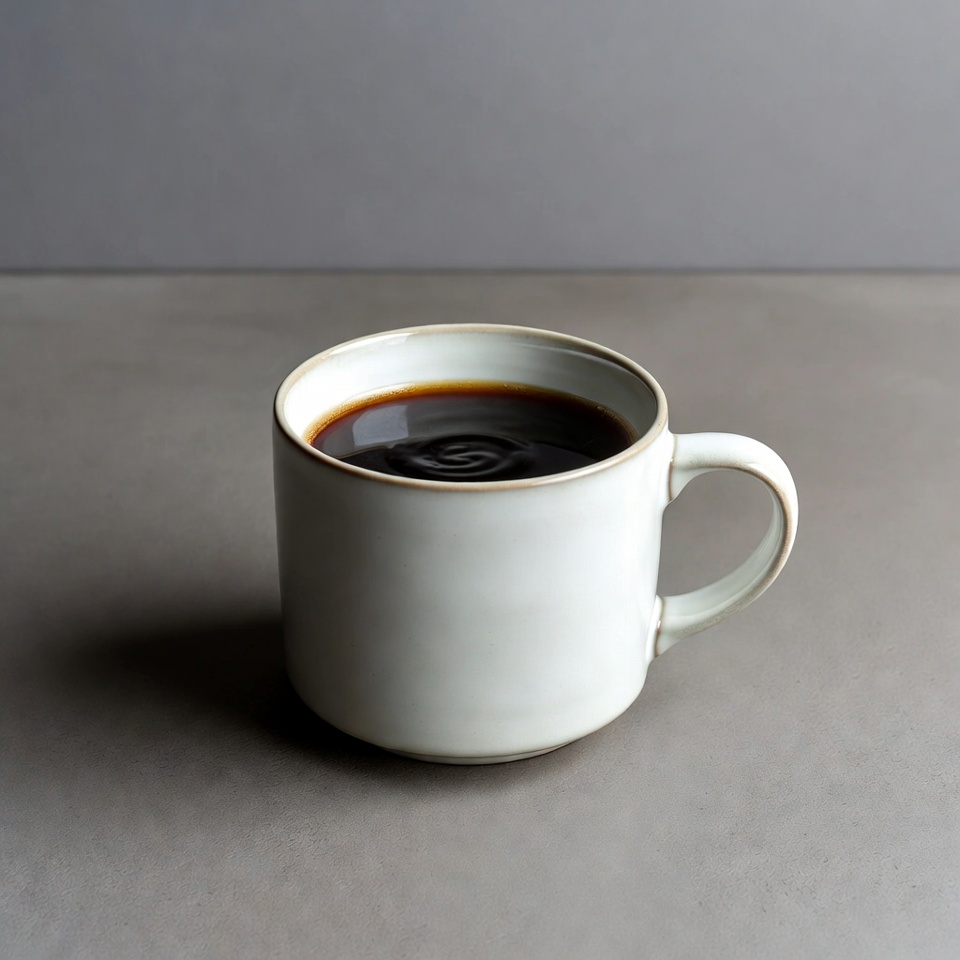 White mug with black coffee White mug with black coffee