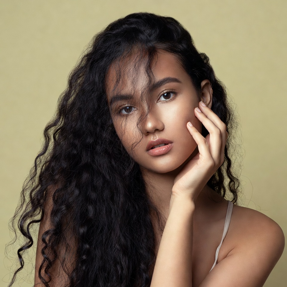 Beautiful woman with curly black hair Beautiful woman with curly black hair