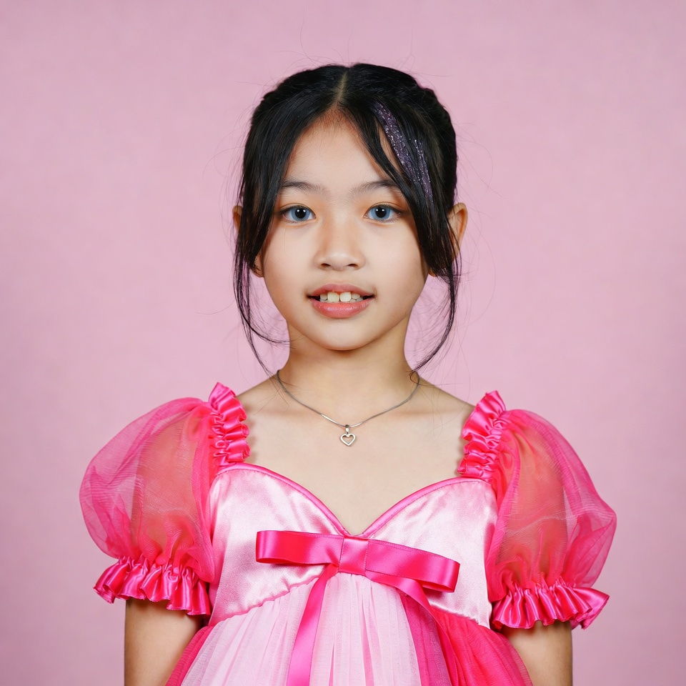 Asian girl in pink princess dress Asian girl in pink princess dress