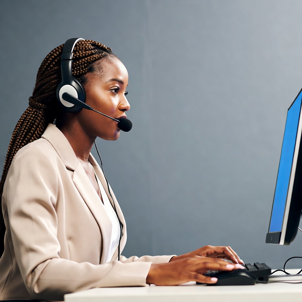 African-American woman on headset call African-American woman on headset call