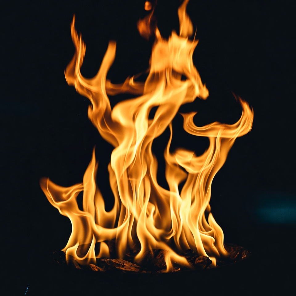 Vibrant flames burning on black background Vibrant flames burning on black background