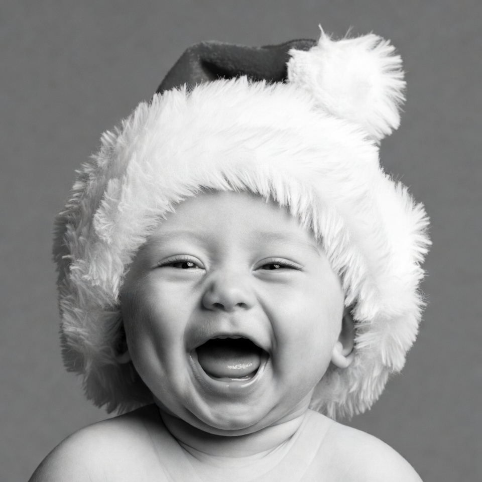 Baby laughing in Santa hat Baby laughing in Santa hat