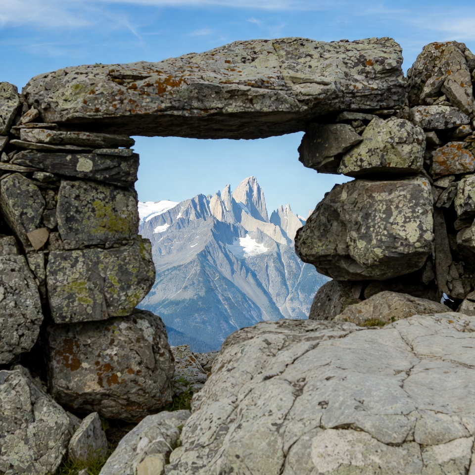 Mountain Peaks Through Stone Window Mountain Peaks Through Stone Window