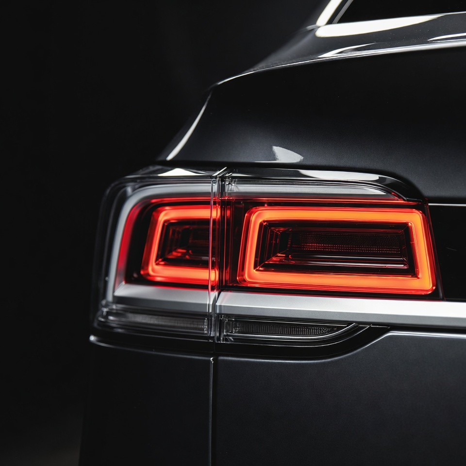 Black SUV Tail Lights Glowing Red Black SUV Tail Lights Glowing Red