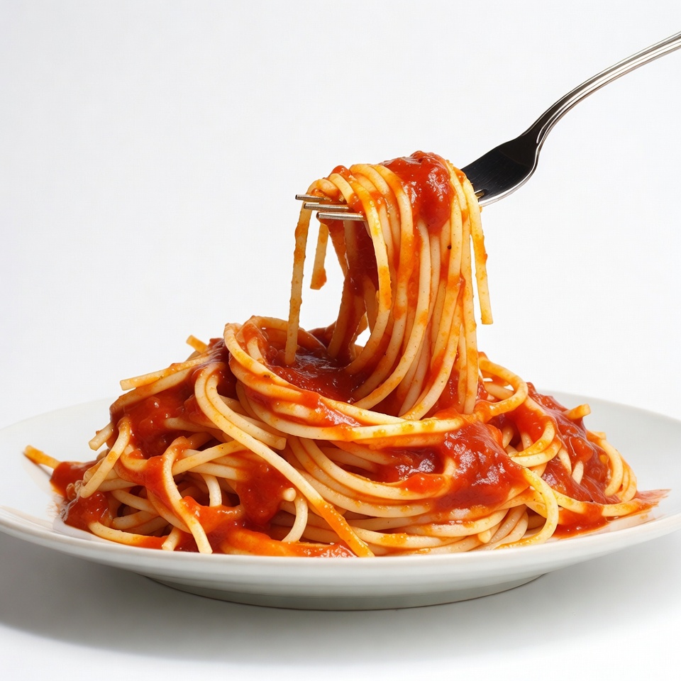 Spaghetti with tomato sauce on fork Spaghetti with tomato sauce on fork