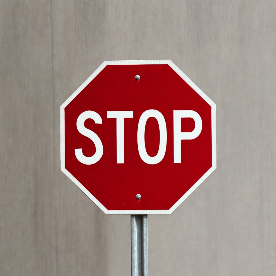 Red stop sign on pole Red stop sign on pole