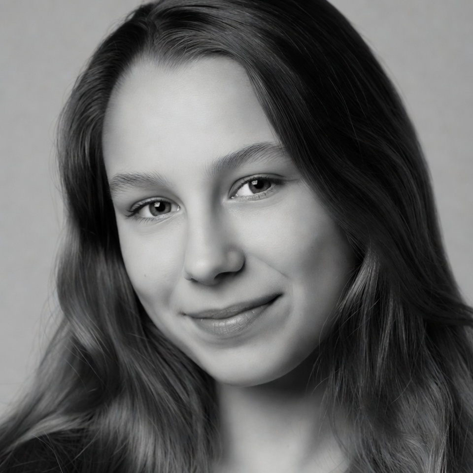 Young woman smiling close-up Young woman smiling close-up