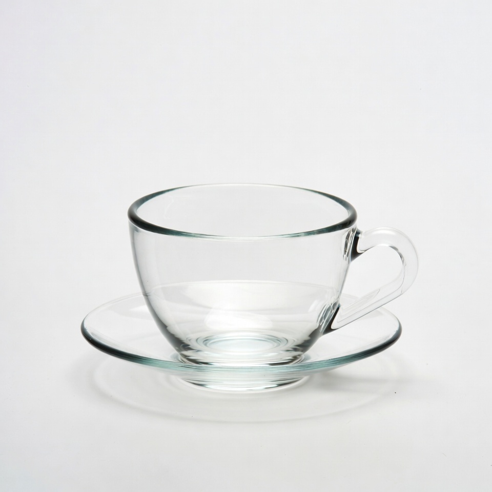 Clear glass teacup with saucer Clear glass teacup with saucer