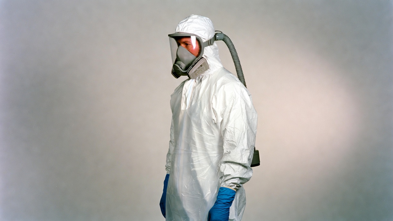 Man in full hazmat suit Man in full hazmat suit