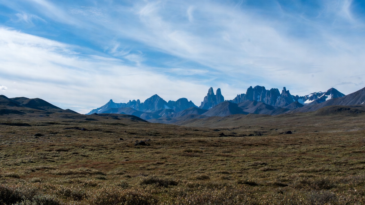Snow-capped Mountains in Vast Grassland Snow-capped Mountains in Vast Grassland