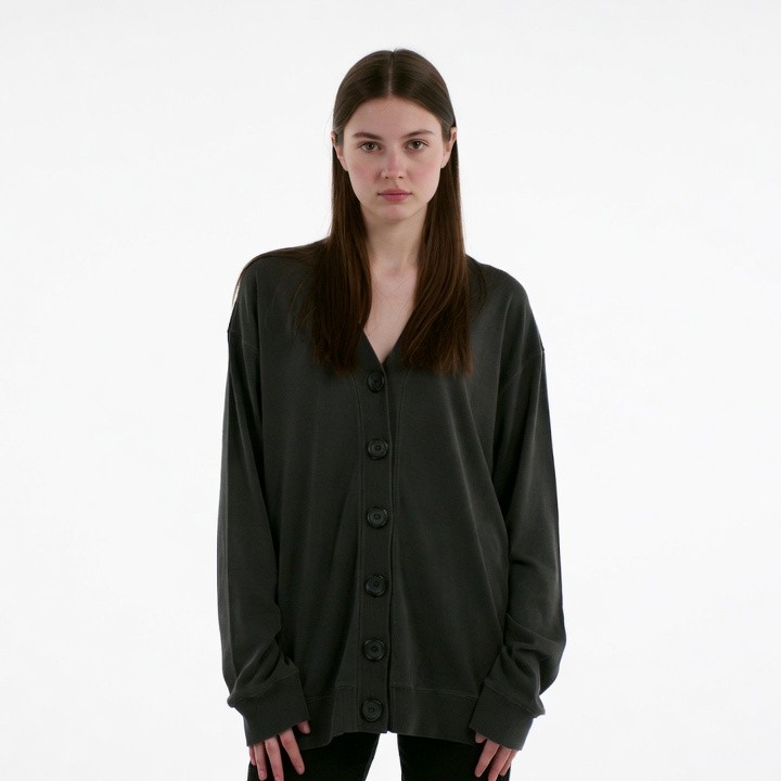 Woman wearing oversized gray cardigan Woman wearing oversized gray cardigan