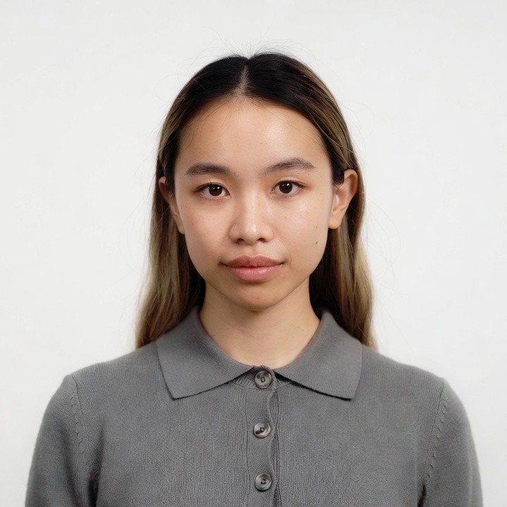 Asian woman in gray polo shirt Asian woman in gray polo shirt