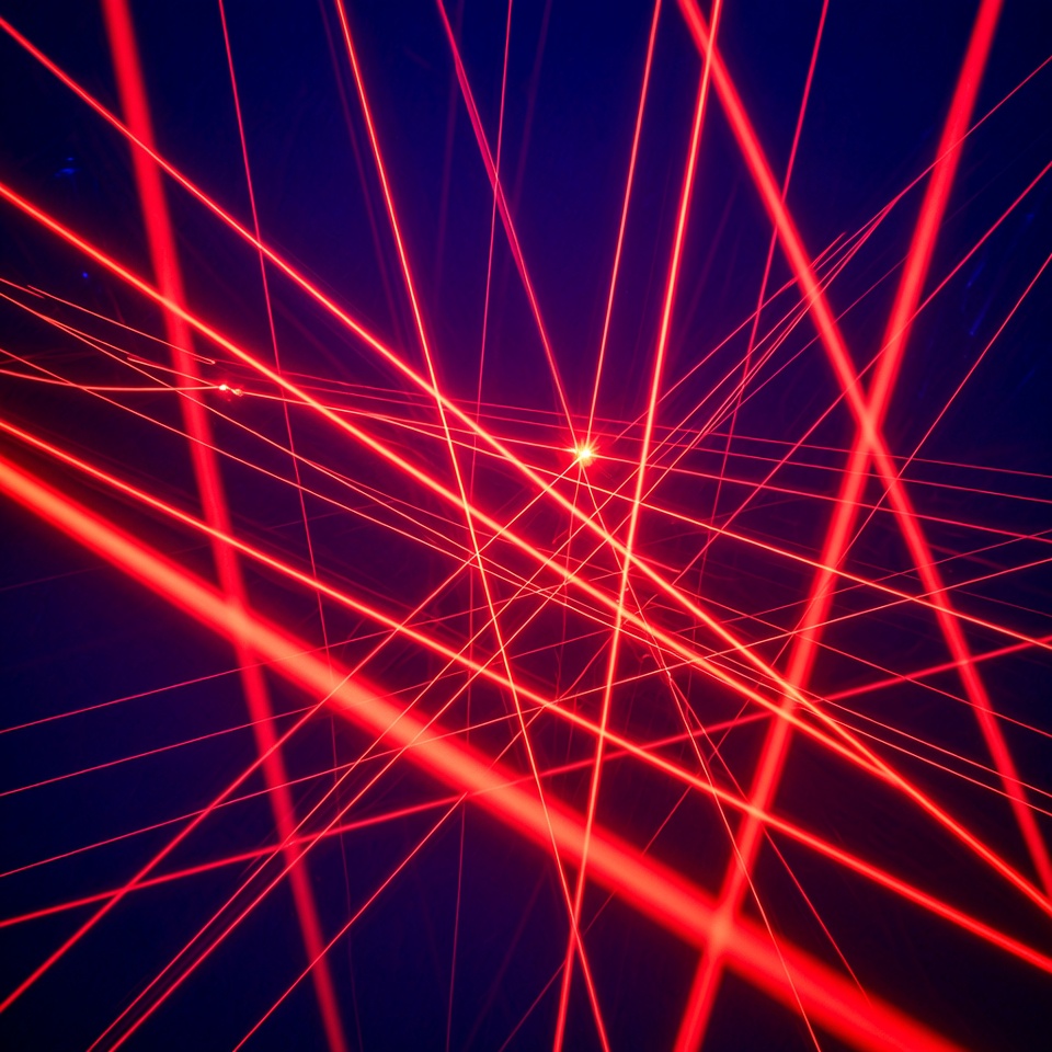 Red Laser Beams on Dark Blue Background Red Laser Beams on Dark Blue Background