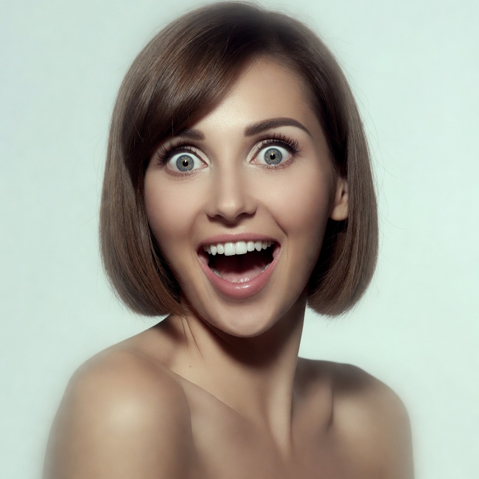 Surprised woman with wide eyes and open mouth Surprised woman with wide eyes and open mouth