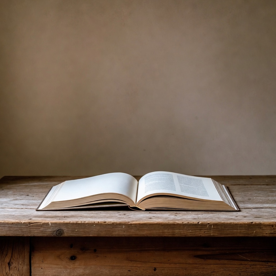 Open book on wooden table Open book on wooden table