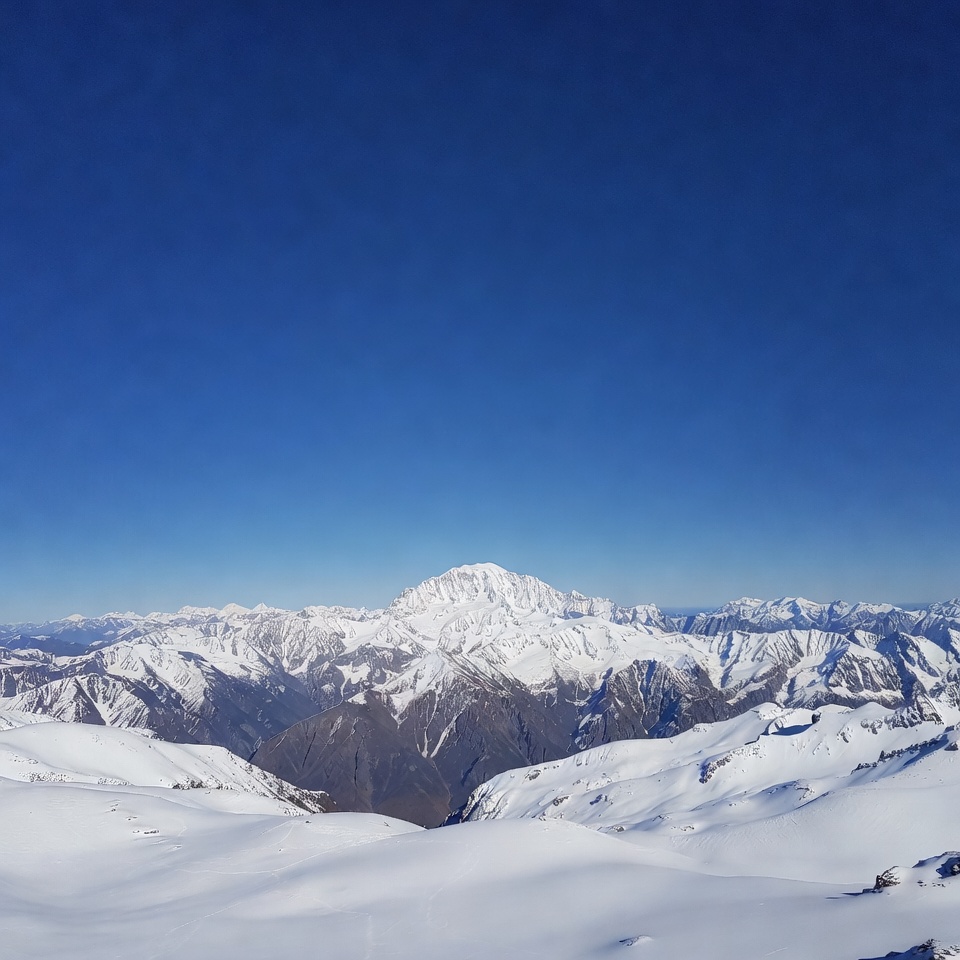 Snowy Mountain Peak under Blue Sky Snowy Mountain Peak under Blue Sky