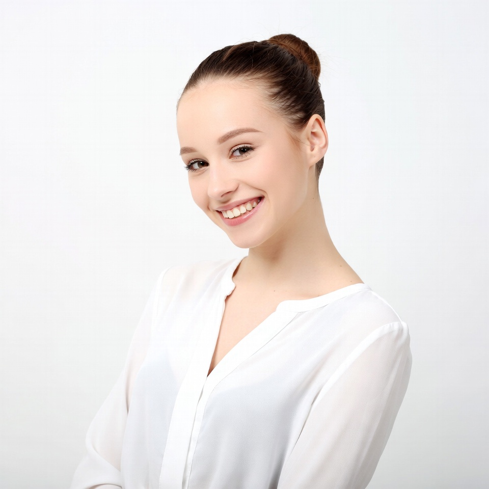 Smiling young woman in white blouse Smiling young woman in white blouse