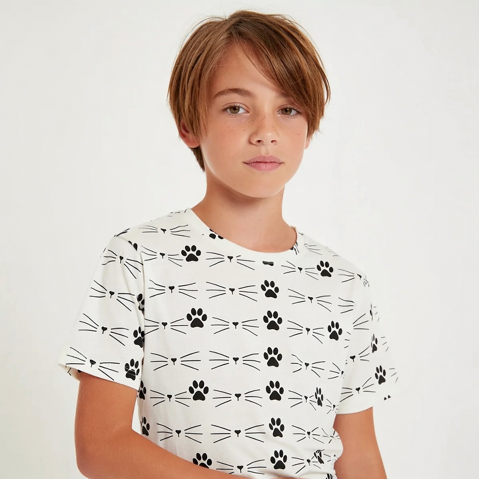 Boy wearing cat paw print t-shirt Boy wearing cat paw print t-shirt