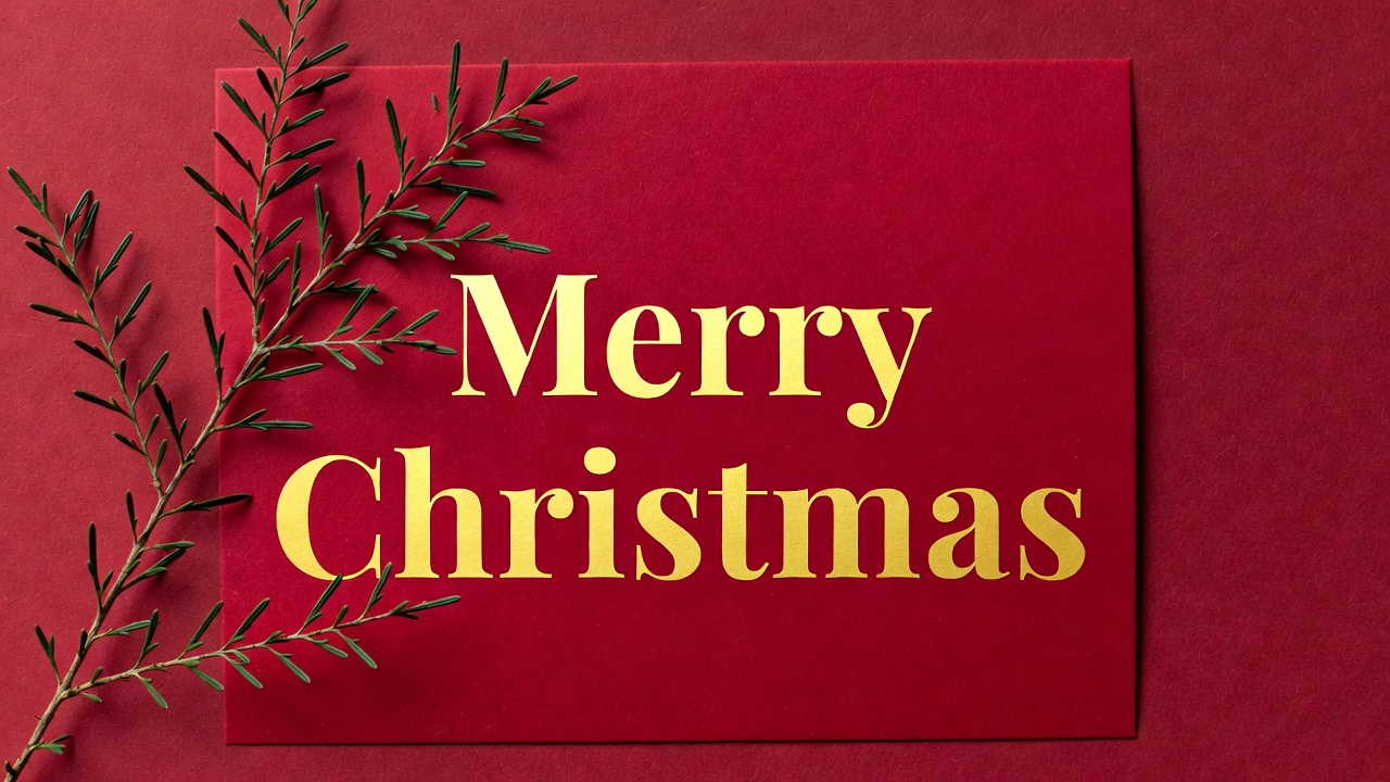 Merry Christmas red card with greenery Merry Christmas red card with greenery