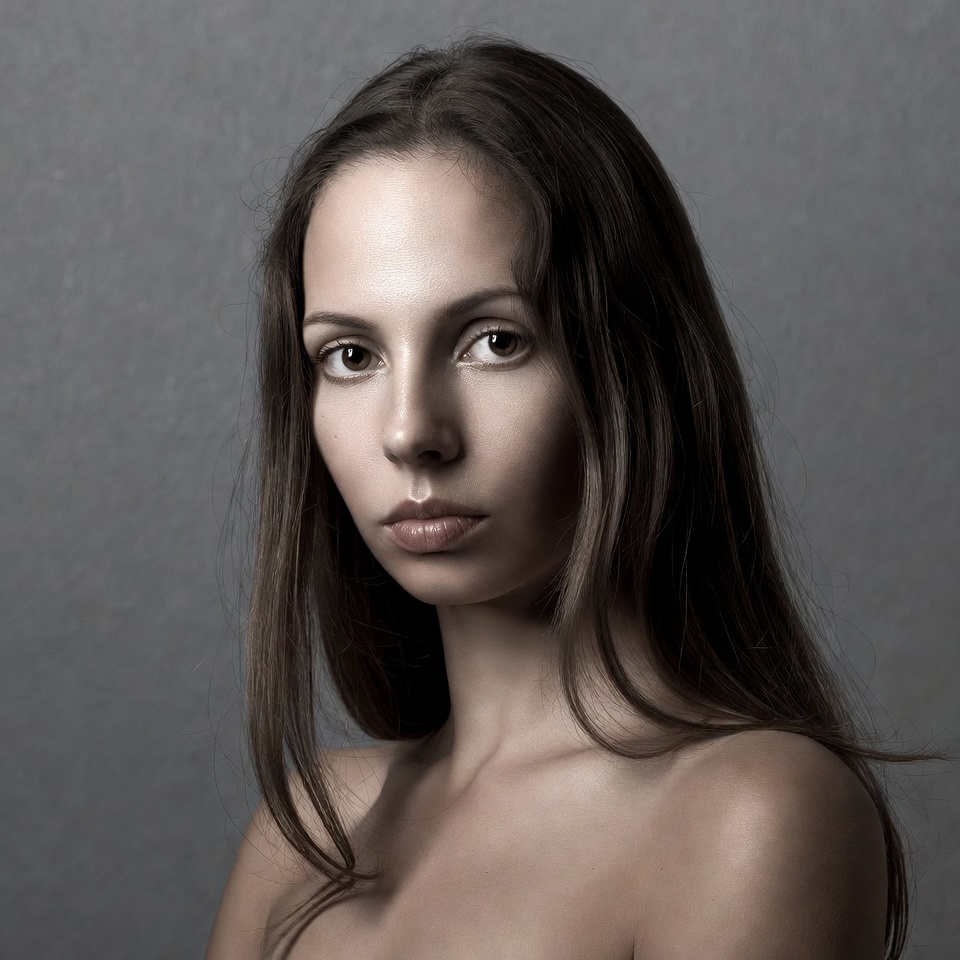 Nude woman with long brown hair Nude woman with long brown hair