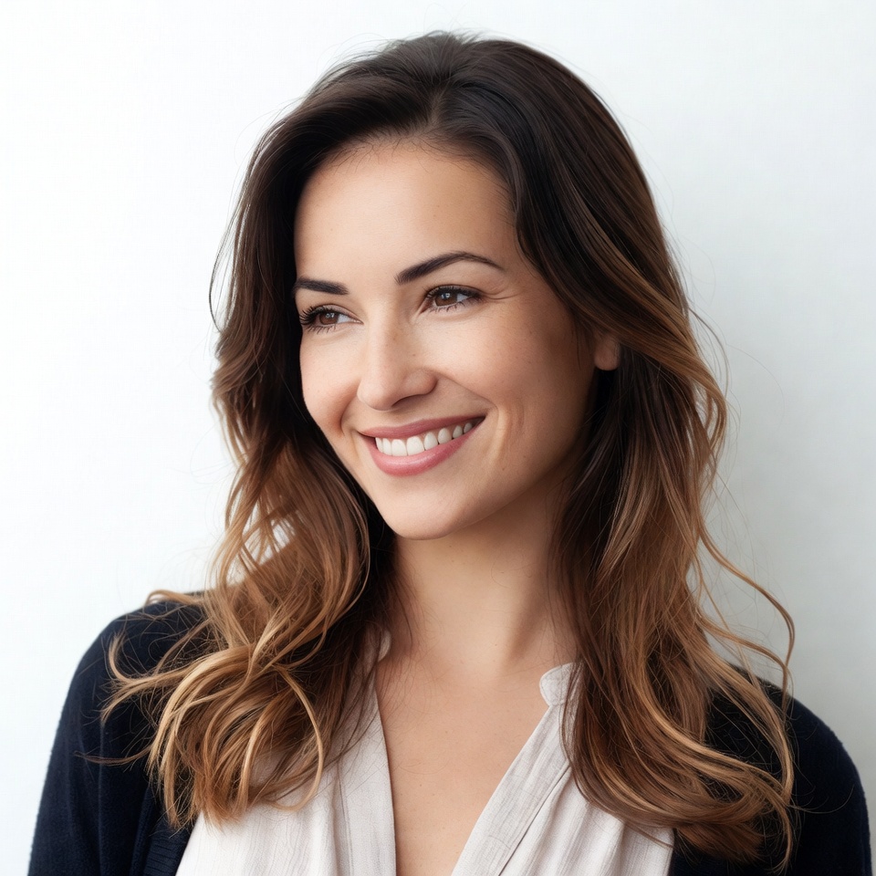 Smiling woman with wavy brown hair Smiling woman with wavy brown hair