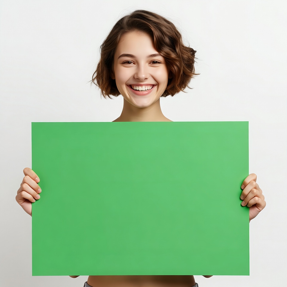 Smiling woman holding green blank sign Smiling woman holding green blank sign