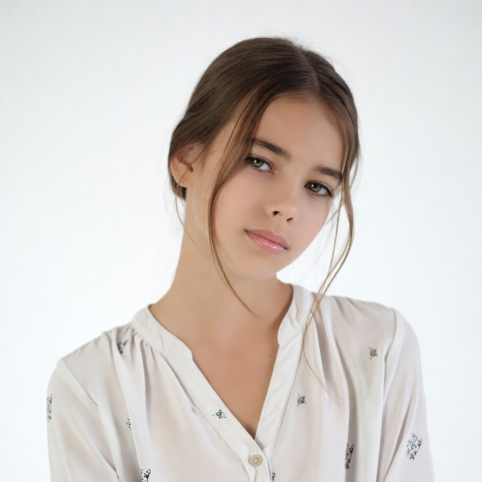 Teen girl with ponytail on white background Teen girl with ponytail on white background