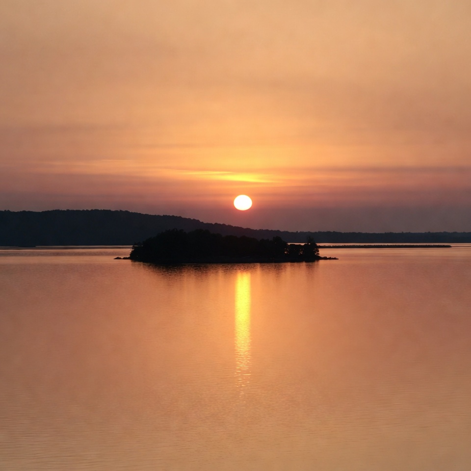 Sunset over island in lake Sunset over island in lake