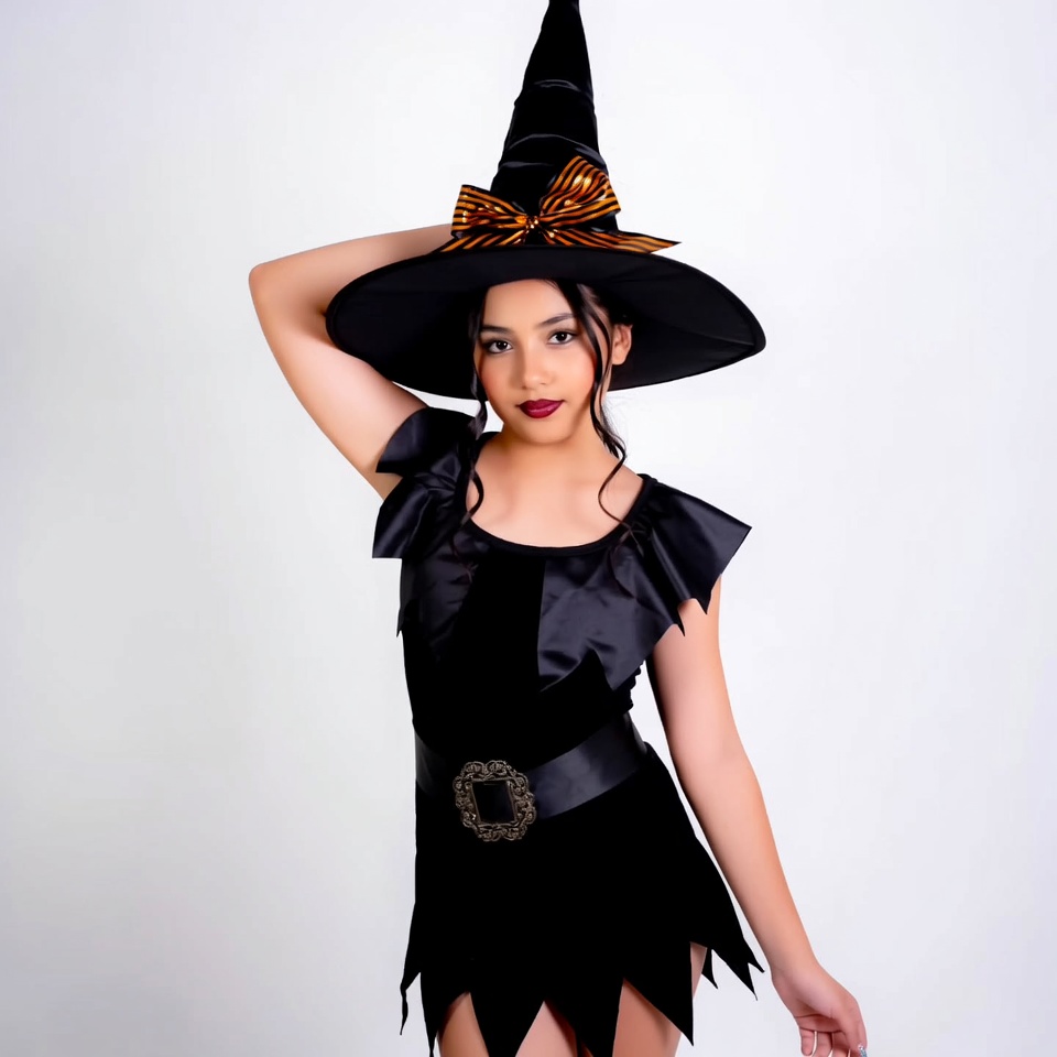 Girl in black witch costume Girl in black witch costume