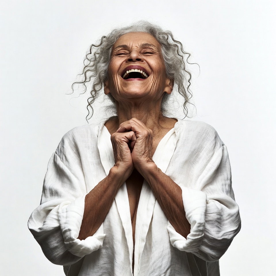 Elderly woman laughing joyfully Elderly woman laughing joyfully