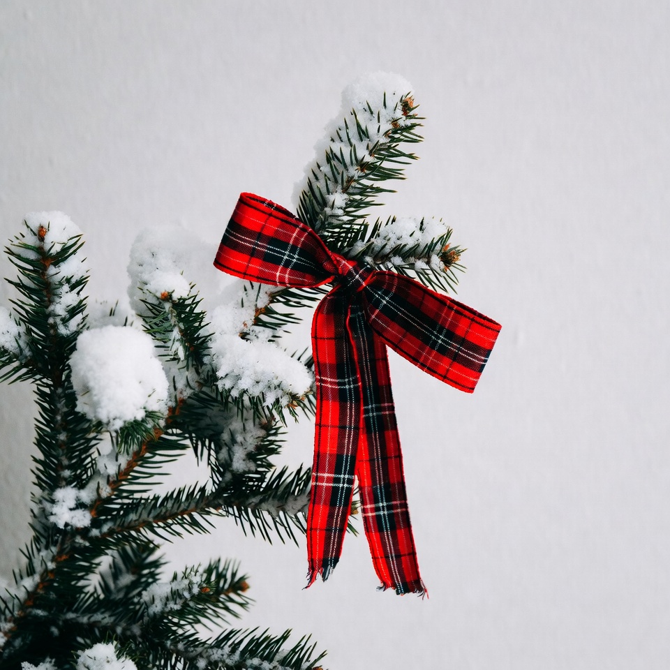 Snowy Christmas Tree with Red Plaid Bow Snowy Christmas Tree with Red Plaid Bow