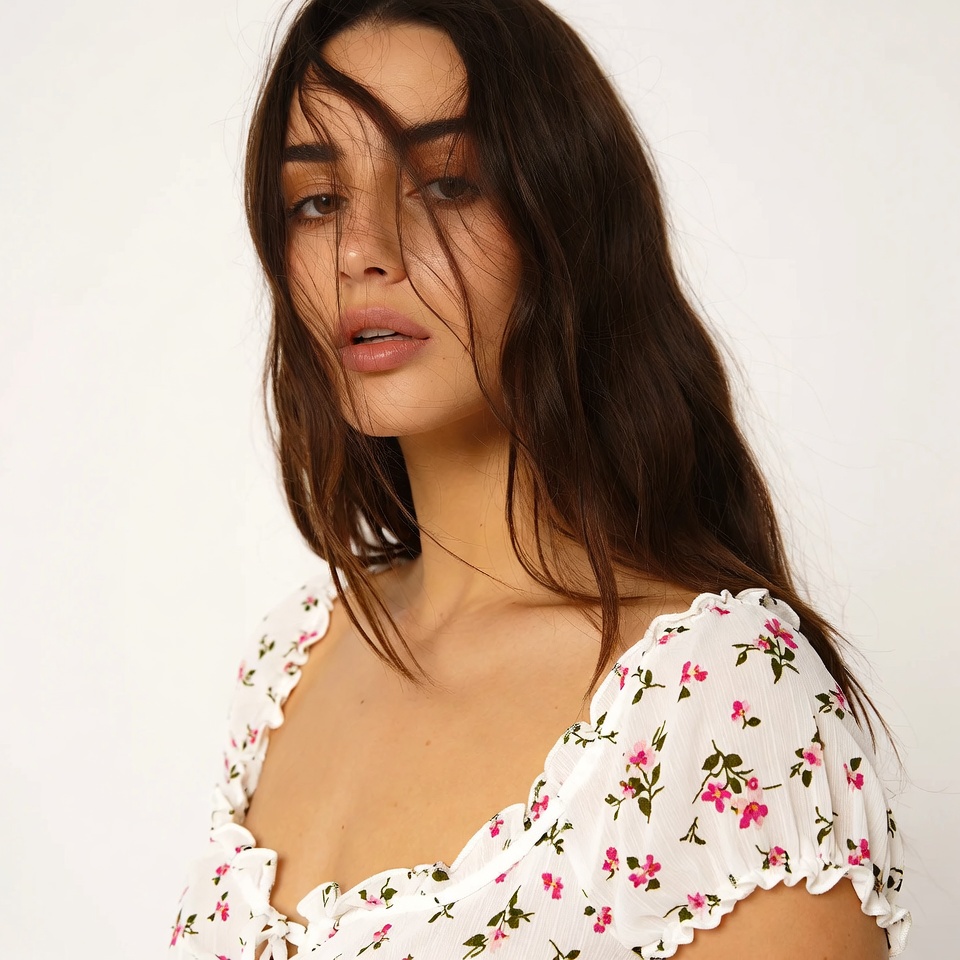 Woman in floral off-shoulder top Woman in floral off-shoulder top