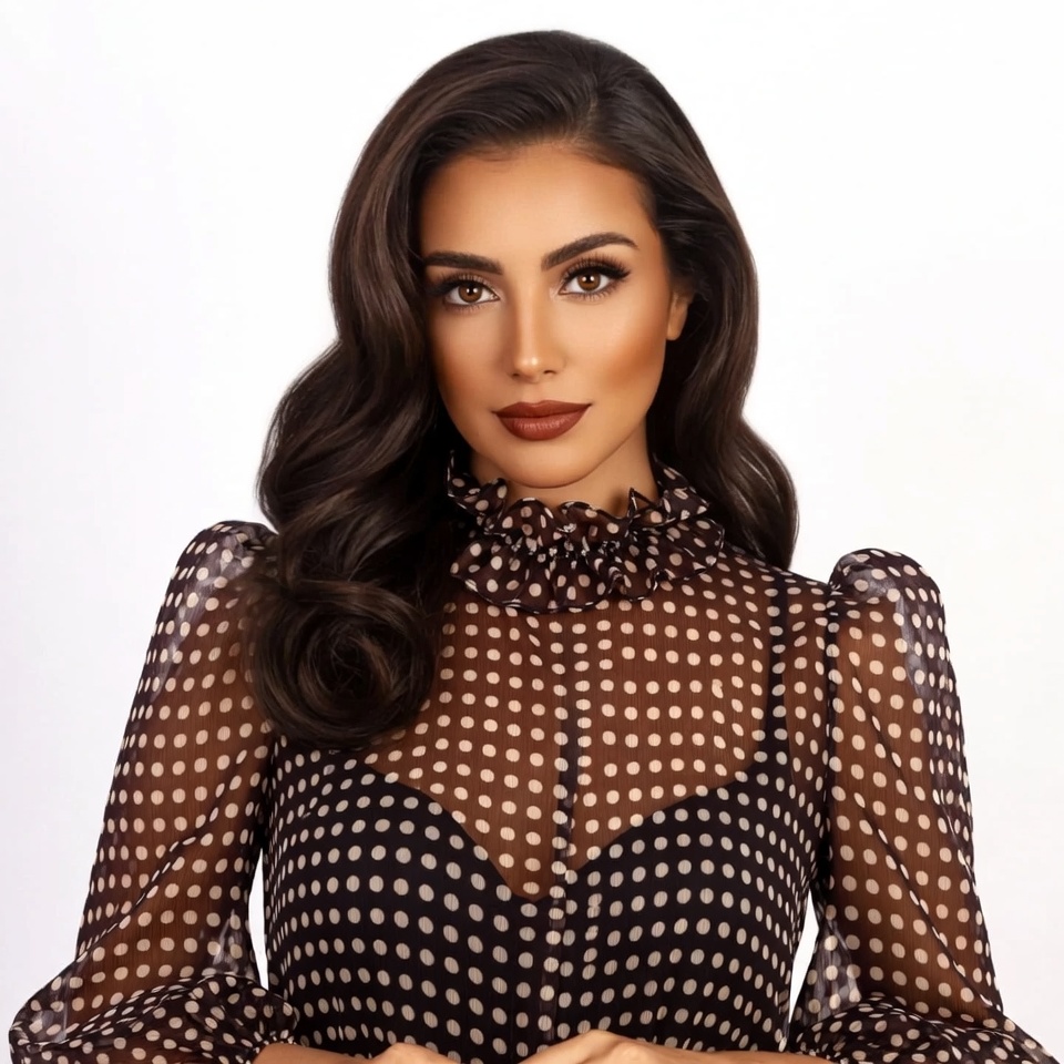 Beautiful woman in sheer polka dot blouse Beautiful woman in sheer polka dot blouse