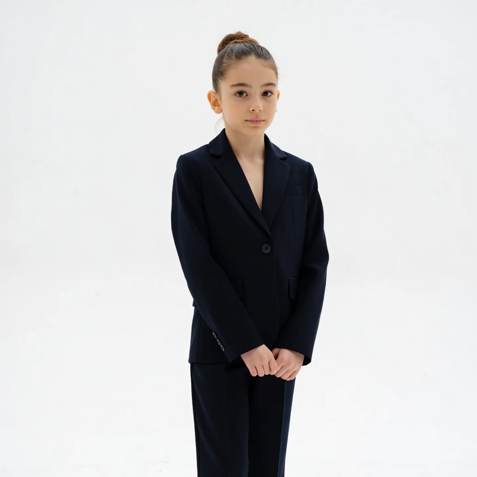 Young girl in black blazer suit Young girl in black blazer suit