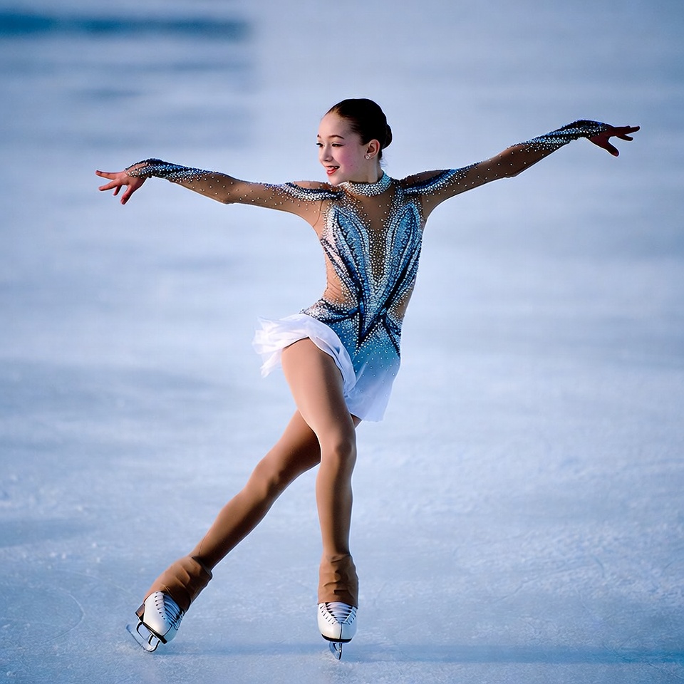 Young girl figure skating on ice Young girl figure skating on ice
