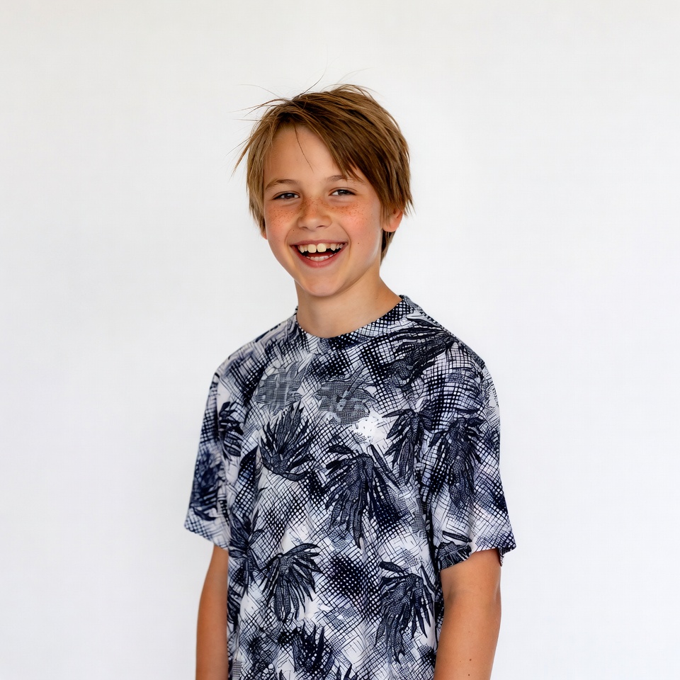 Smiling boy in patterned t-shirt Smiling boy in patterned t-shirt