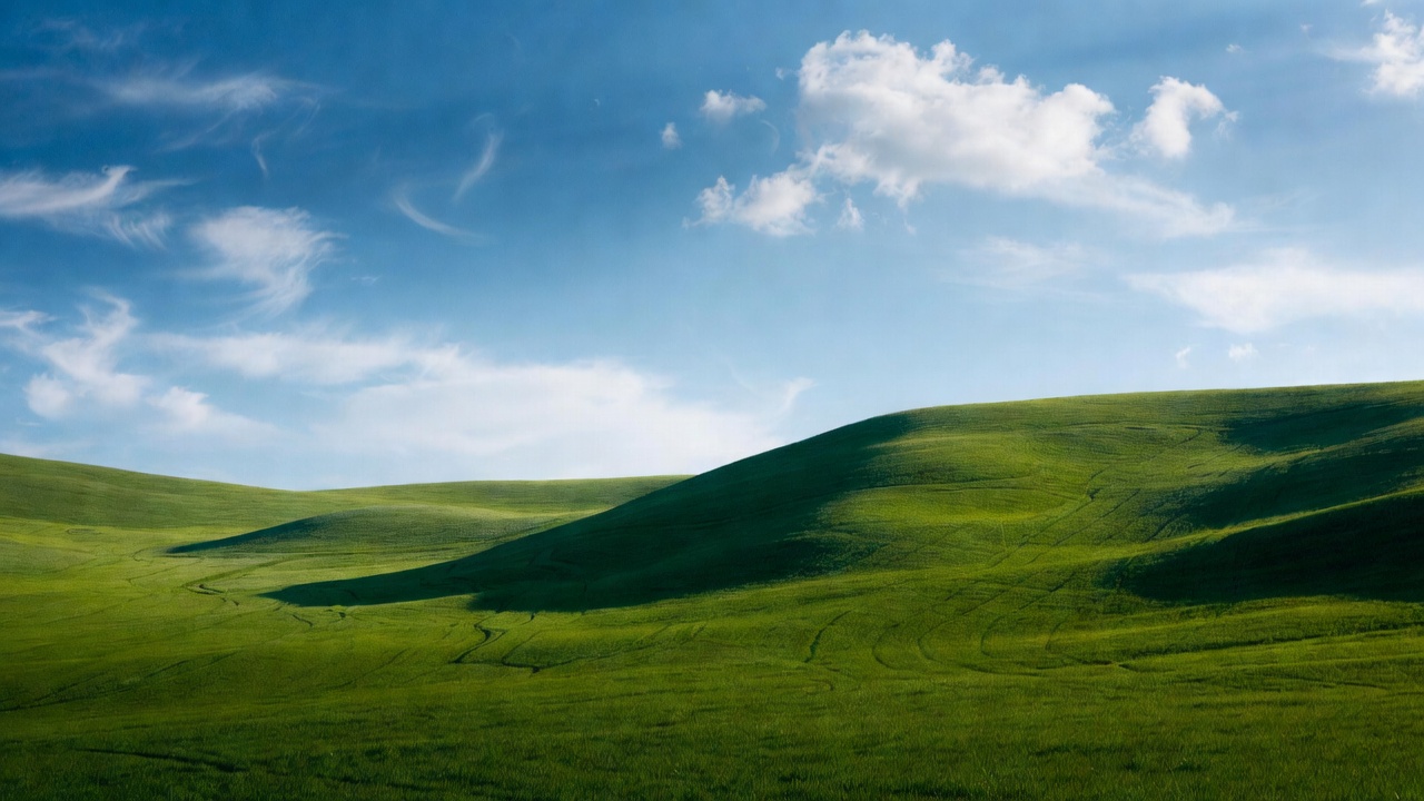 Green Rolling Hills Under Blue Sky Green Rolling Hills Under Blue Sky
