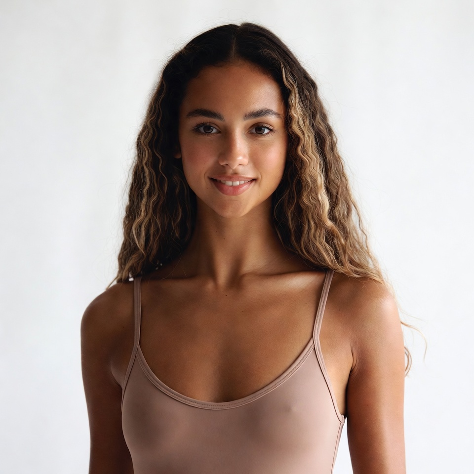 Smiling woman in beige camisole Smiling woman in beige camisole