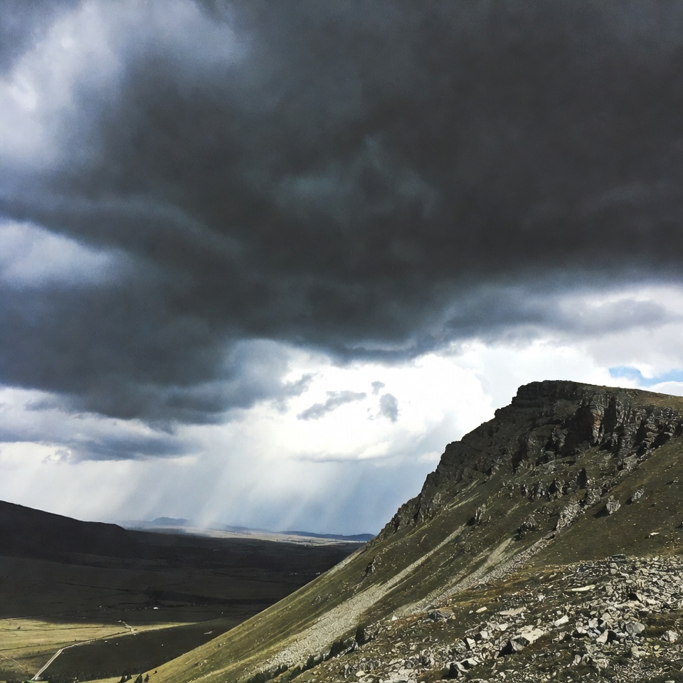 Dramatic Clouds Over Mountain Cliff Dramatic Clouds Over Mountain Cliff