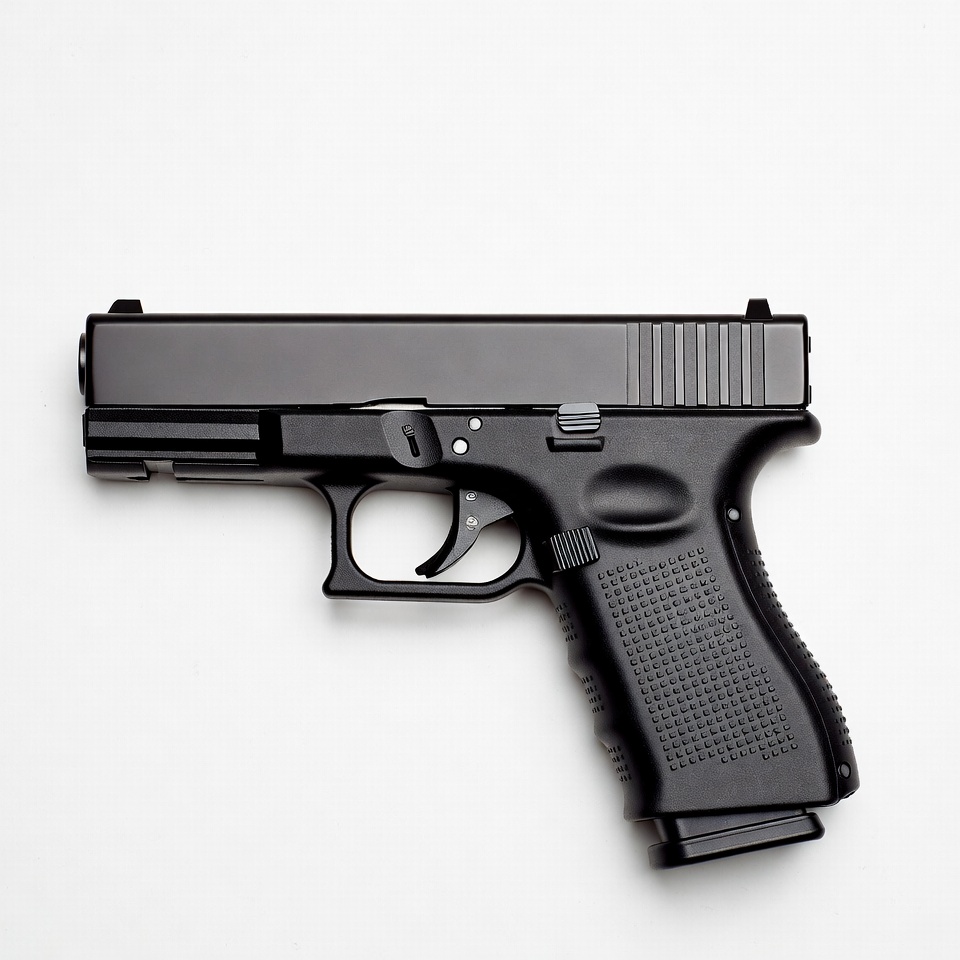 Black Glock Pistol on White Background Black Glock Pistol on White Background