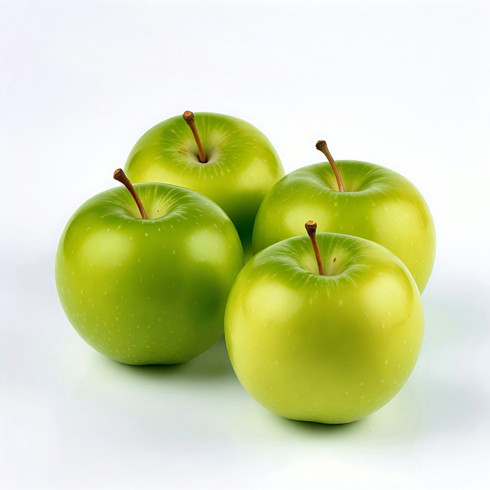 Four green apples on white background Four green apples on white background