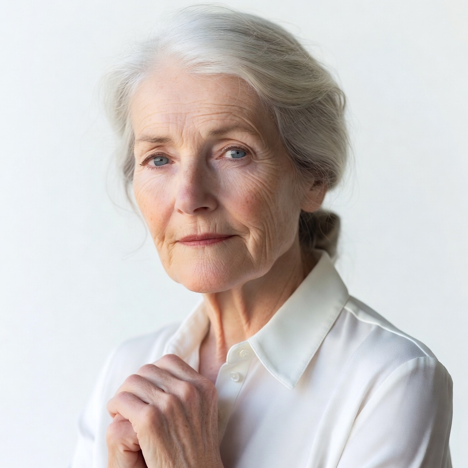 Elderly woman with hands clasped Elderly woman with hands clasped