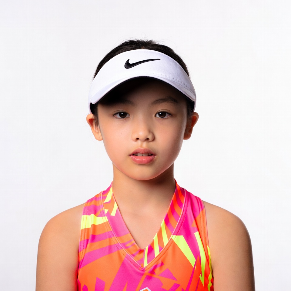 Asian girl in Nike tennis visor Asian girl in Nike tennis visor