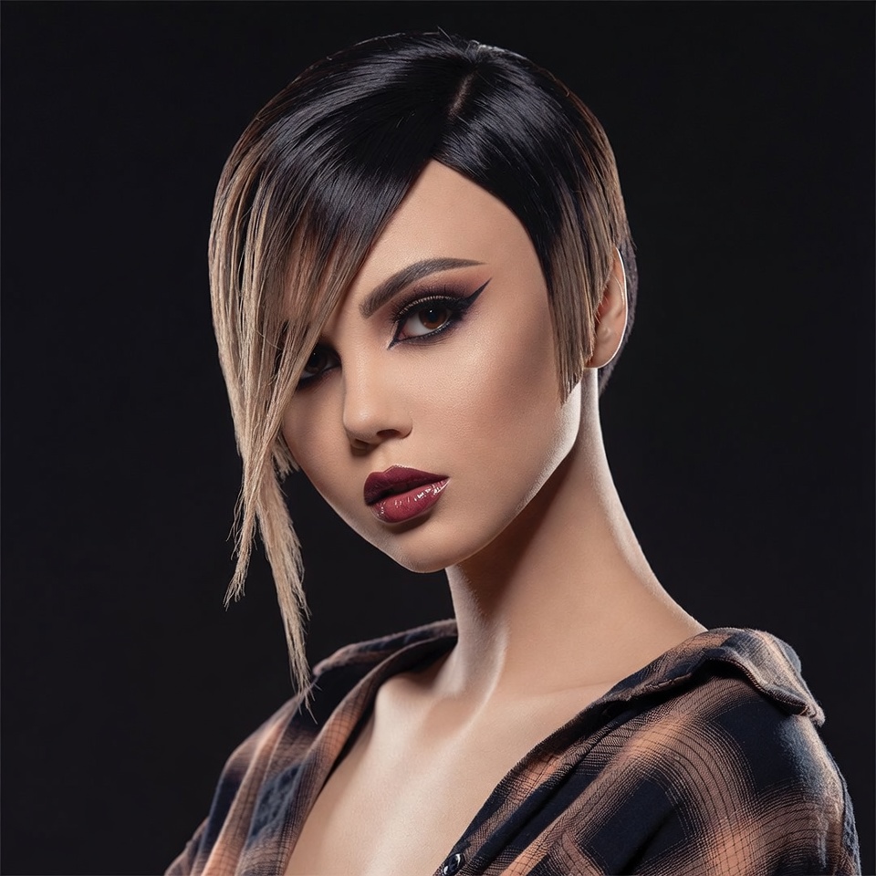 Woman with short asymmetrical bob haircut Woman with short asymmetrical bob haircut