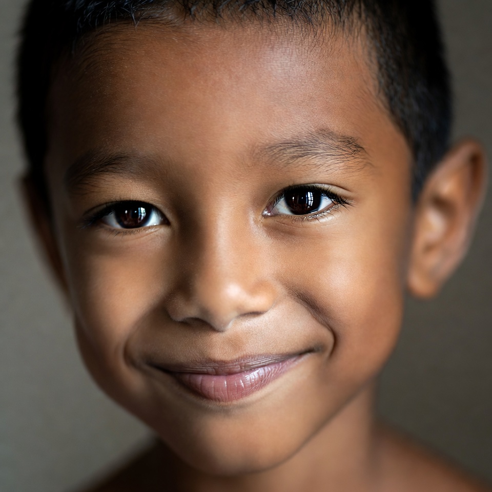 Smiling Asian boy close-up Smiling Asian boy close-up