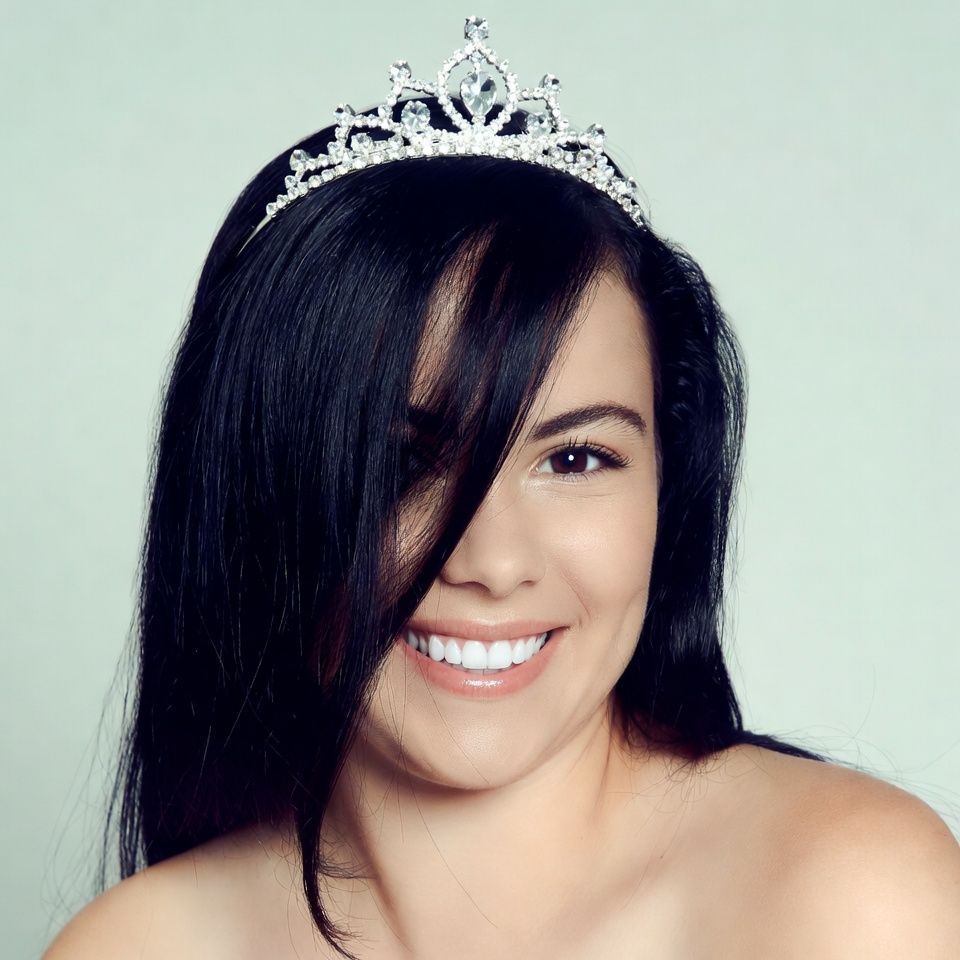 Woman smiling with tiara Woman smiling with tiara