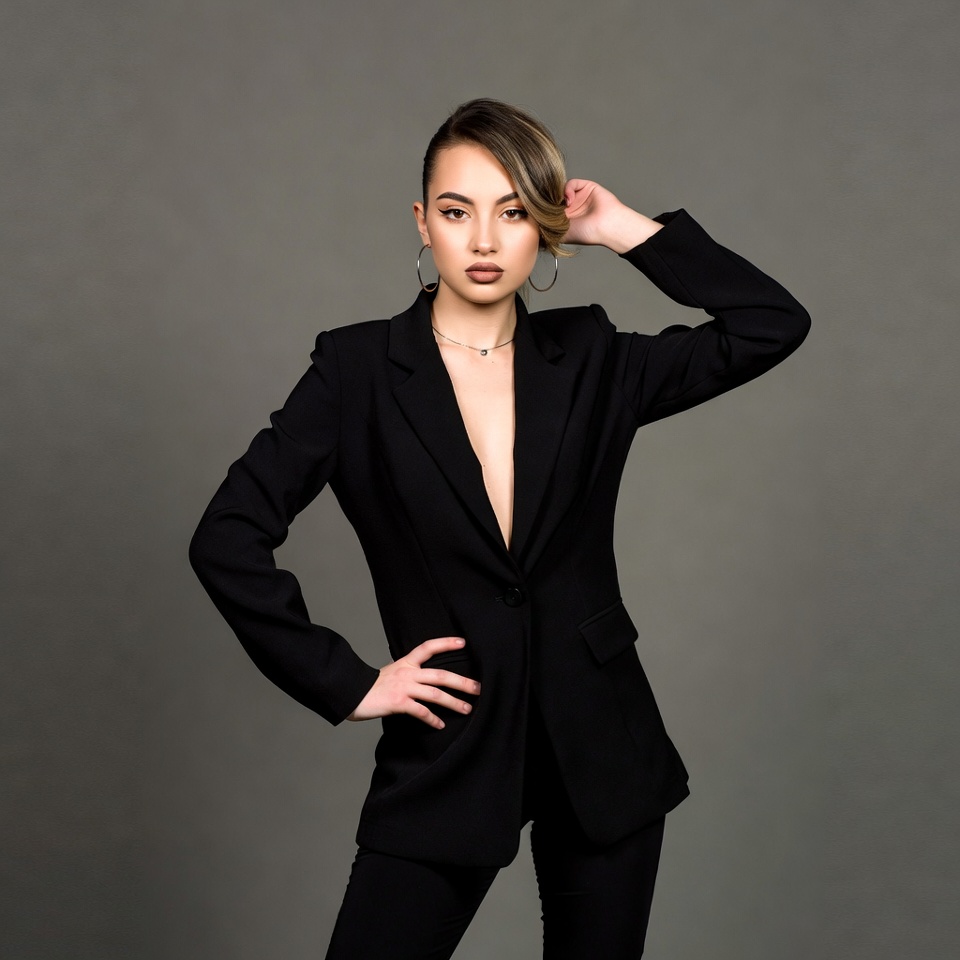 Asian woman in black blazer posing Asian woman in black blazer posing