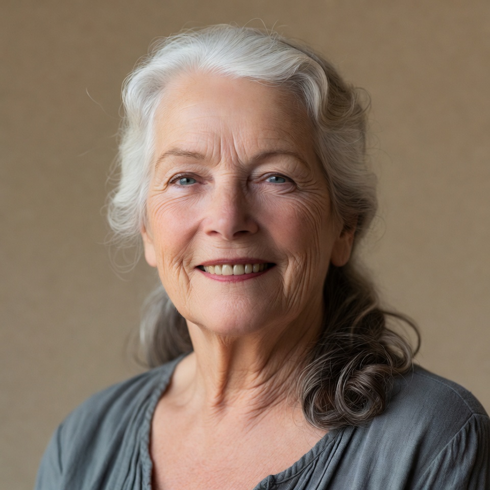 Elderly woman smiling with silver hair Elderly woman smiling with silver hair
